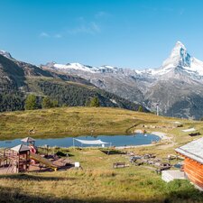 The Wolli Adventure Park at lake Leisee with playground and perfect view of the Matterhorn.  | © Basic Home Production